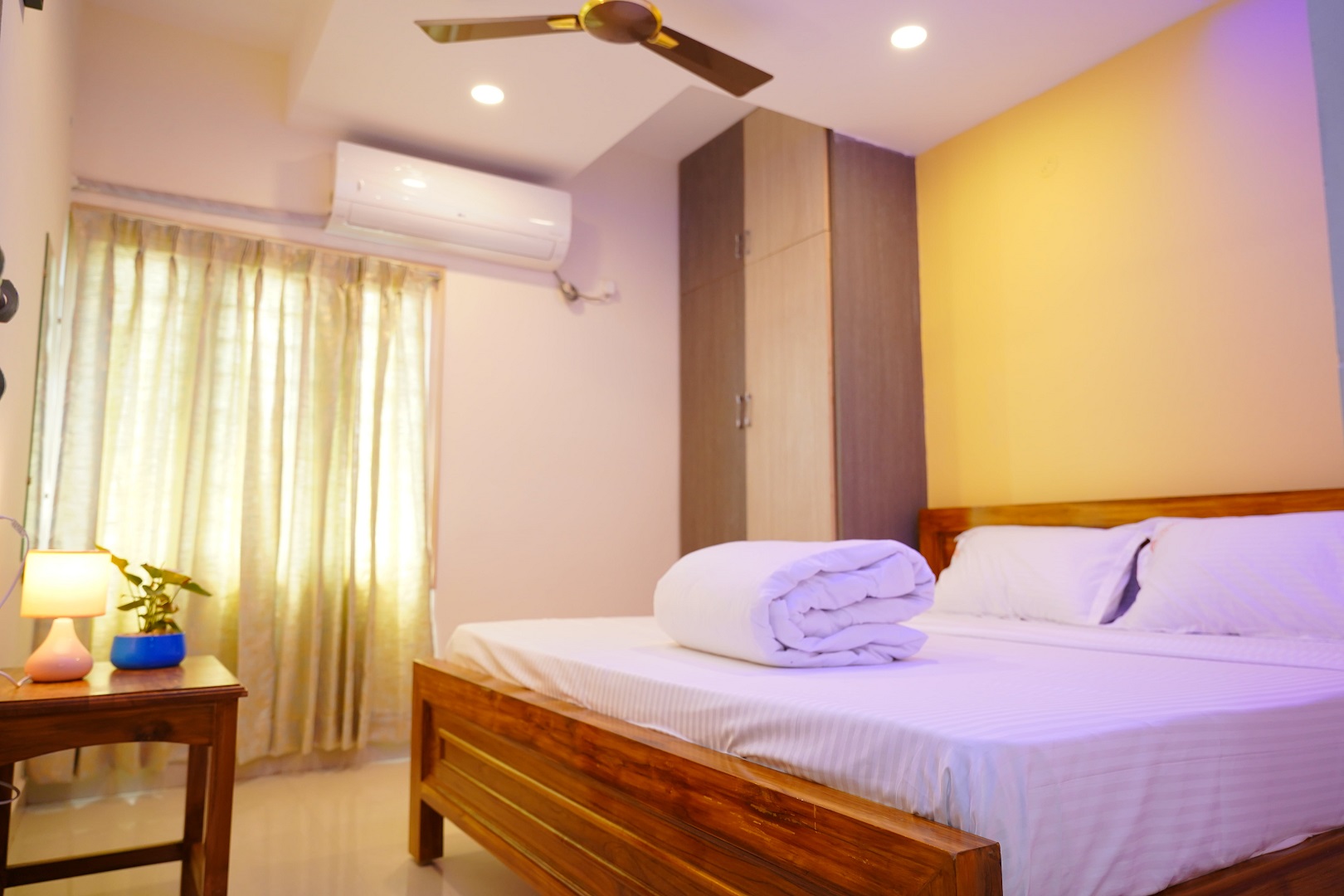 Priya Woodz Homestay interior seating area